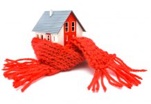 Welke voordelen heeft isolatie? huis met sjaal eromheen