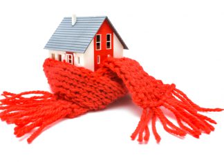 Welke voordelen heeft isolatie? huis met sjaal eromheen